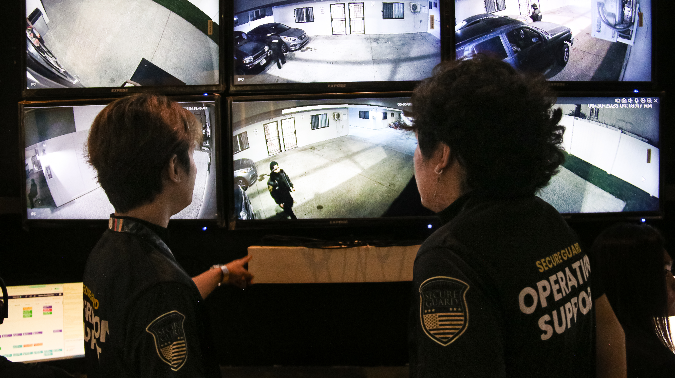 Security control room with CCTV monitors
